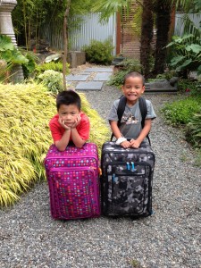 Tuck and Jones with their suitcases packed and ready to go!