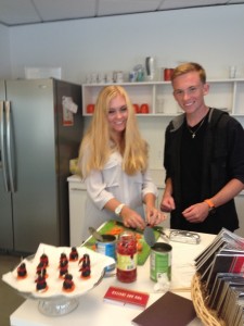 Allie and Nick Spangler making cream cheese penguins for party!