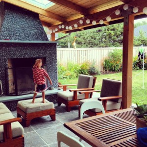 Tuck dancing in front of outside fireplace :)