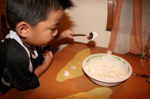 Jones spooning out the ricotta mixture for his ravioli creations