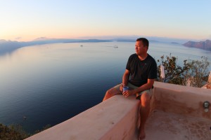 Cliff enjoying a peaceful cup of coffee at sunrise on our roof deck before the kids are awake