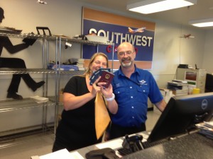 Lisa with the SW Freight guy who drove onto the tarmac to get our passports 1.5 hours before flight time!