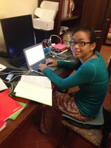 Yve writing her weekly blog post