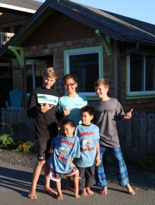 The Gang with their Cleanline Shirts in front of the cottage in Cannon Beach! Thanks Cleanline!