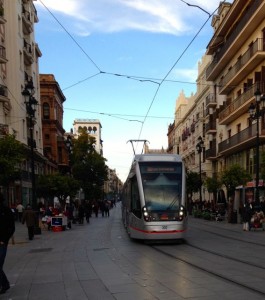 Seville's main boulevard in the historic downtown makes way for a electric train for commuting 