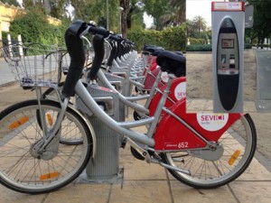 Bikes in Seville are the same as Barcelona with an added bonus of being able to use a credit card so no need to "join" the system.