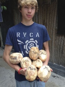 armful of coconuts